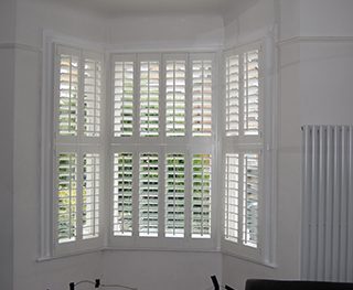 Tier On Tier Living Room Shutters