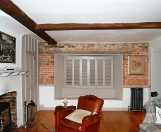 Interior window shutters