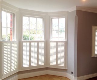 Bay sash window shutters